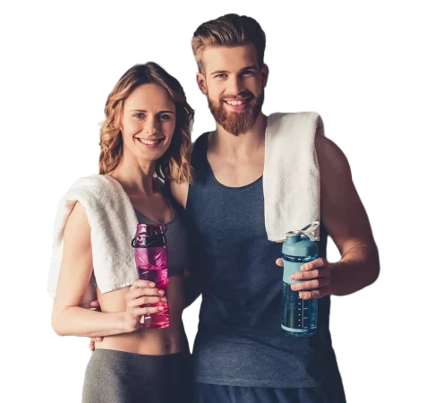 fit-couple-smiling-camera-gym-600w-328165874-puf8qcl6cyq2y05fk4tuse4lmsp4fvjvnxu0vj9edc